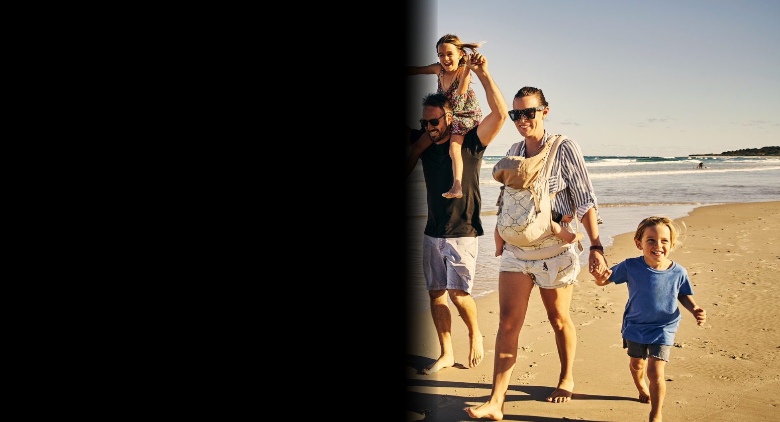 Stroke: Image of a happy family walking on the beach where vision is severely blurred across half the image.