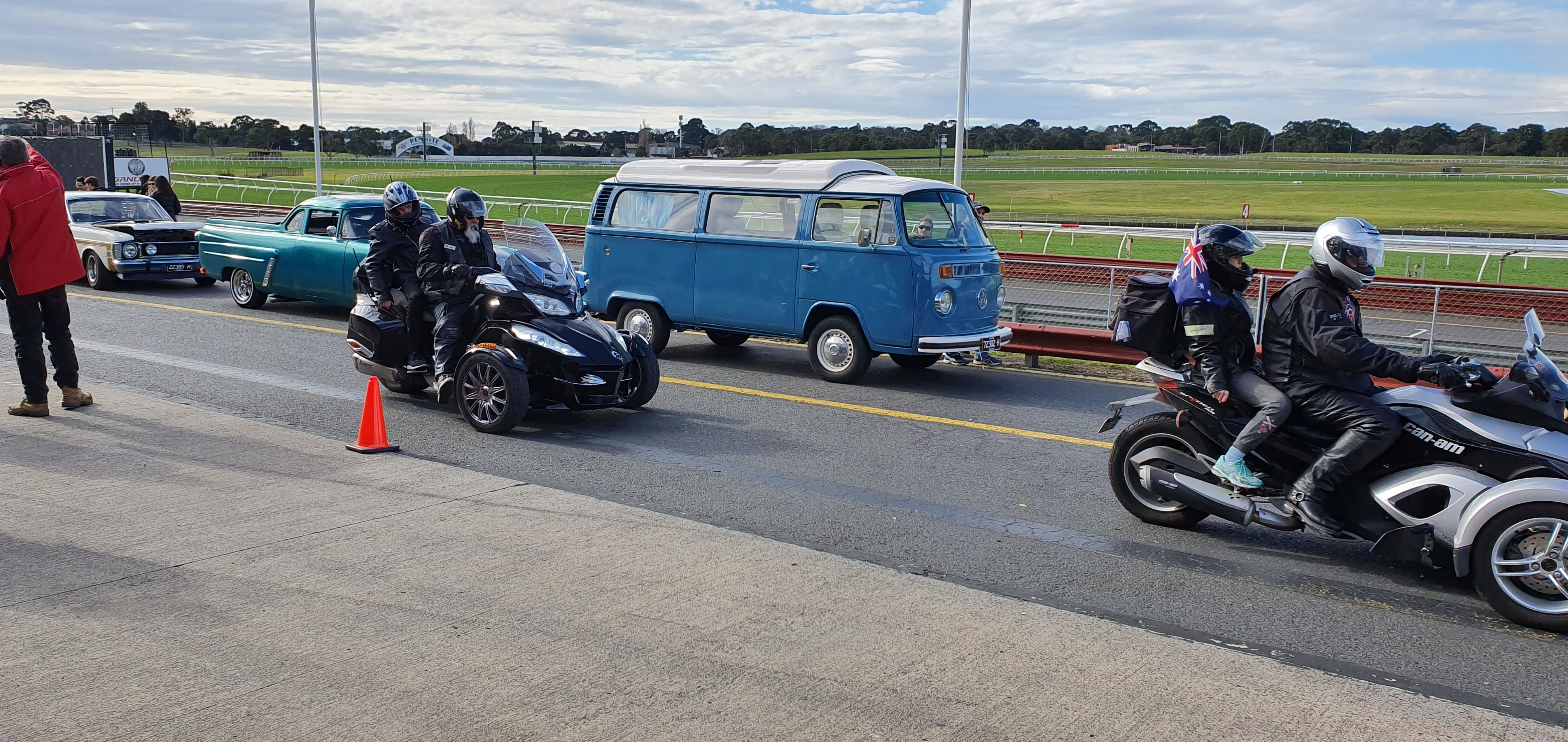 "Two motorbikes head off on their lap of the Racecourse."