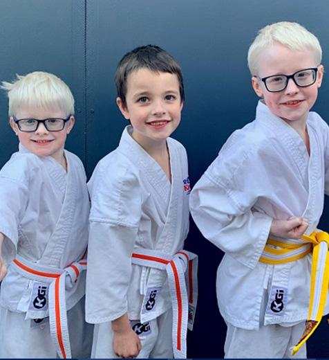 The three Bradley boys in their Karate whites