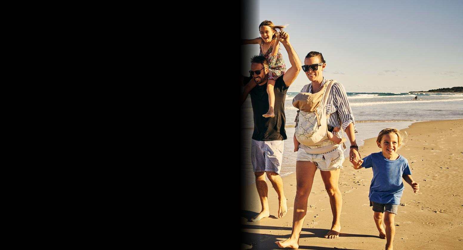 Stroke: Image of a happy family walking on the beach where vision is severely blurred across half the image. Stroke: Image of a happy family walking on the beach where vision is severely blurred across half the image.
